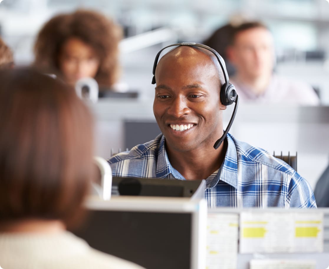 gentleman at call center smiling