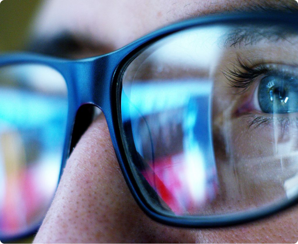 close-up of a gentleman wearing glasses