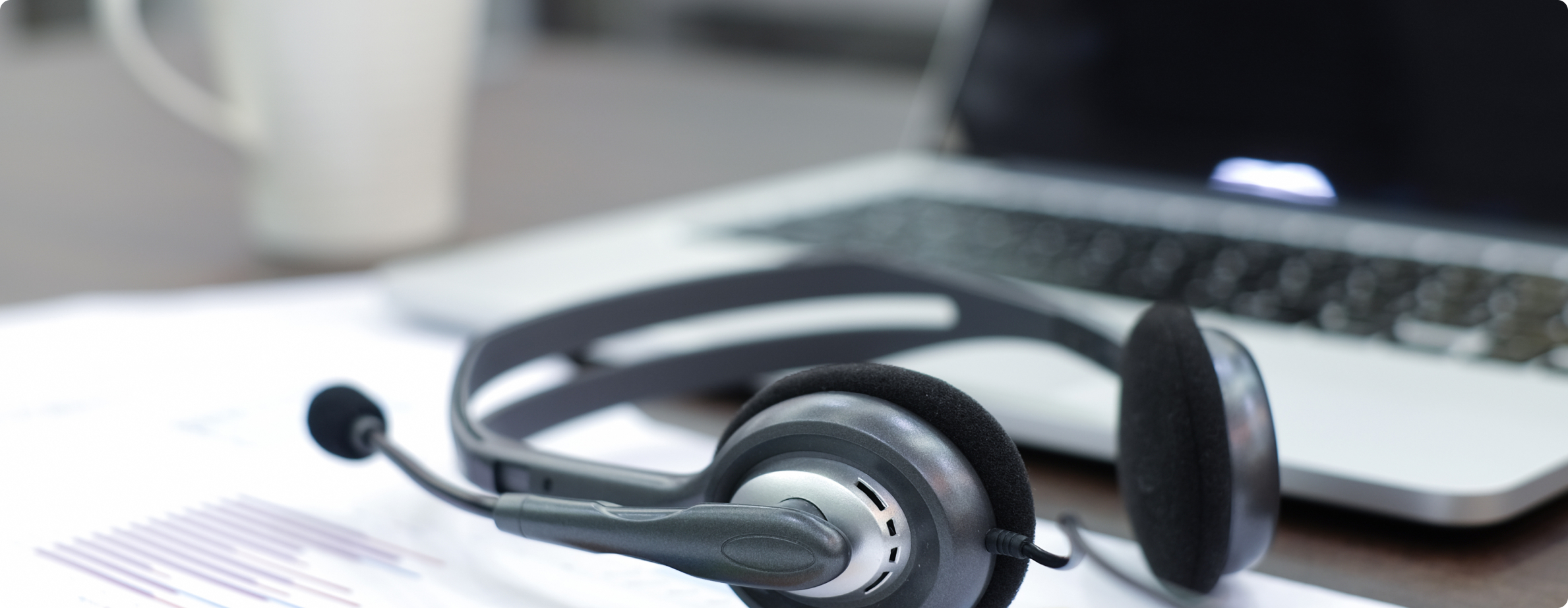 close-up of headset in front of computer