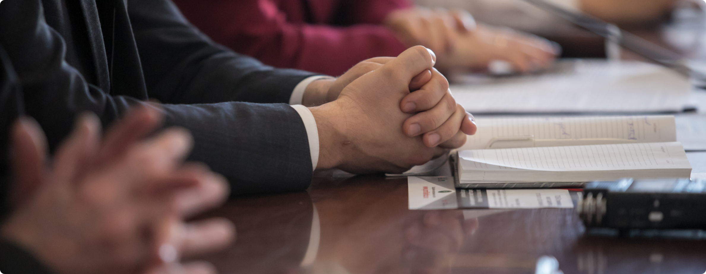 close-up of gentleman folding his hands