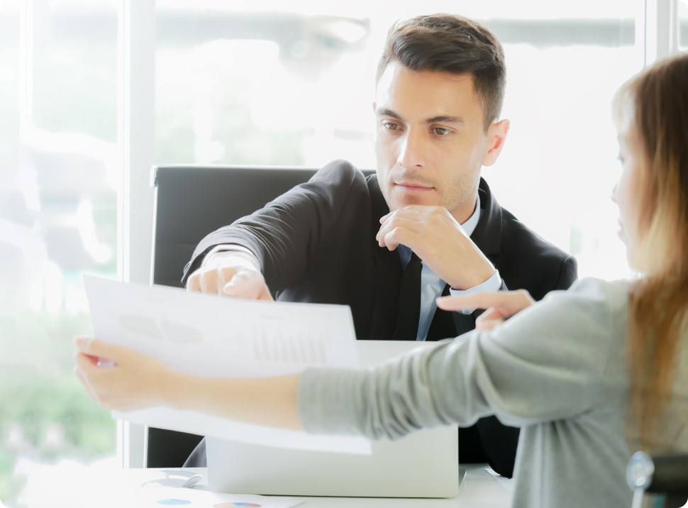 gentleman and woman going over document papers