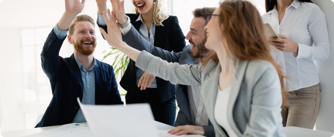 group of coworkers high fiving