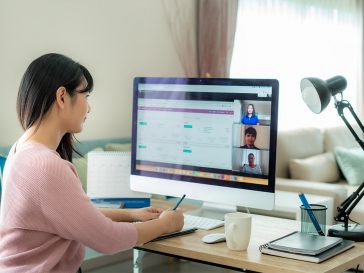 remote worker using cybersecurity tips to work safely from home