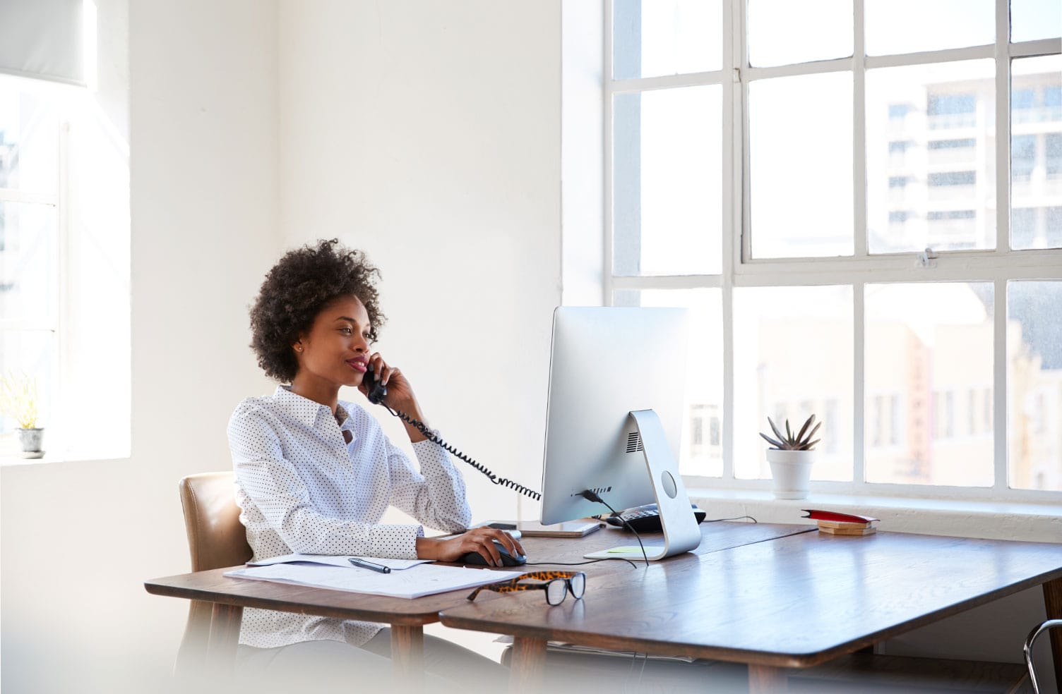 employee using business phone