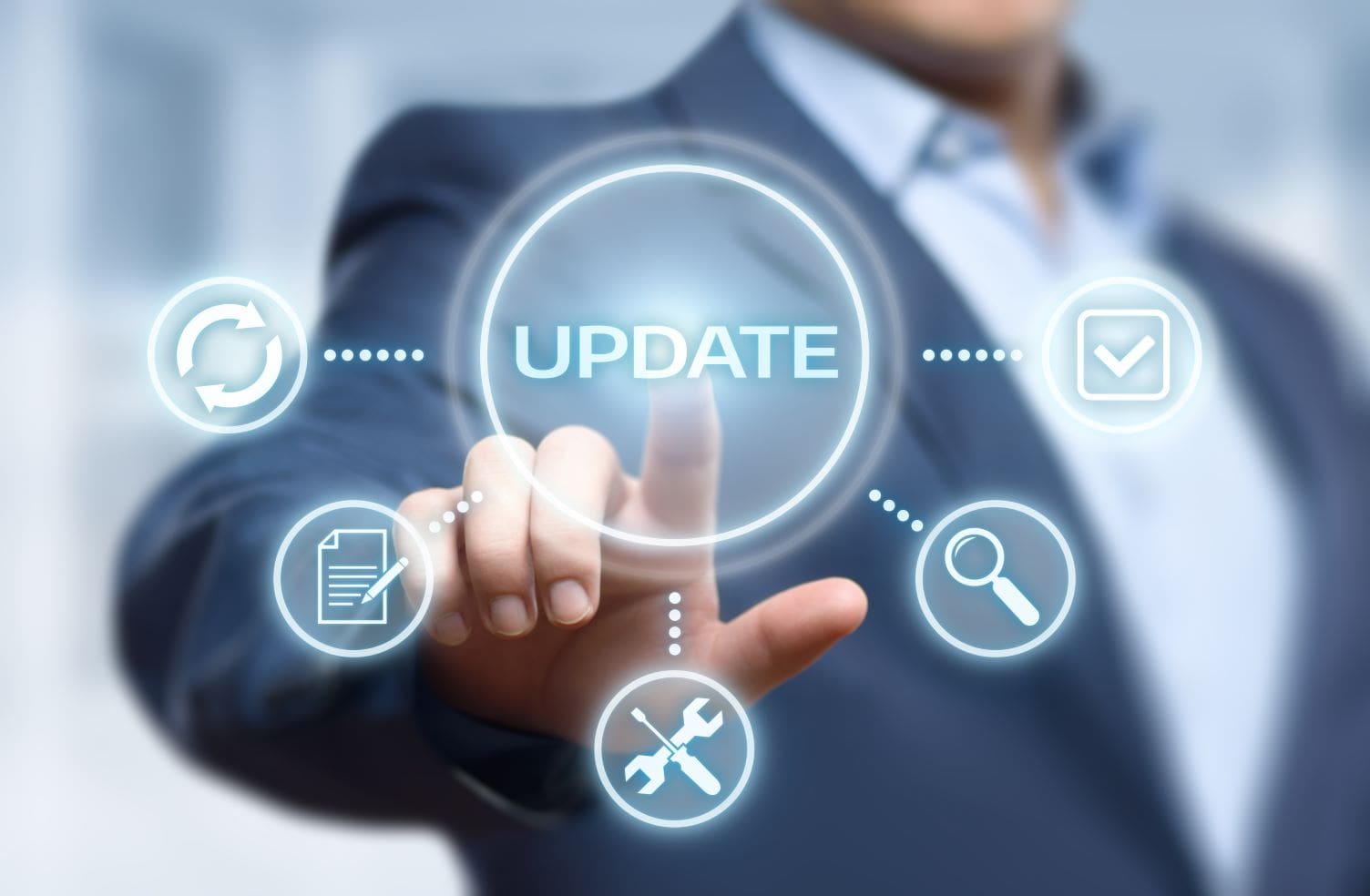 man pointing to update icon