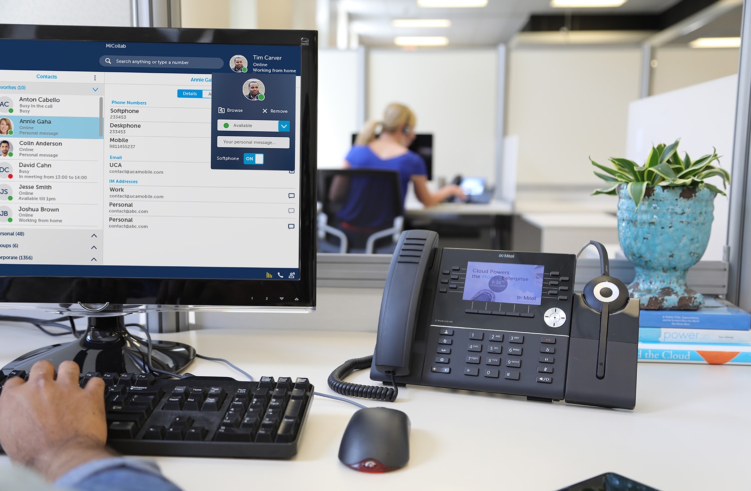 man using mitel mivoice 6930 phone system