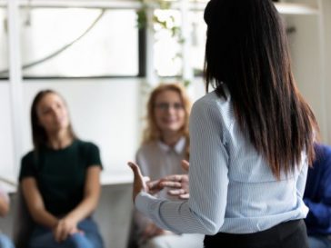 woman leading meeting